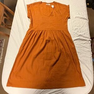 Boho linen dress with pockets - on trend for fall. rust color size M